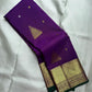 Royal Purple Kanjivaram silk saree with jewel-toned radiance and antique-gold zari.