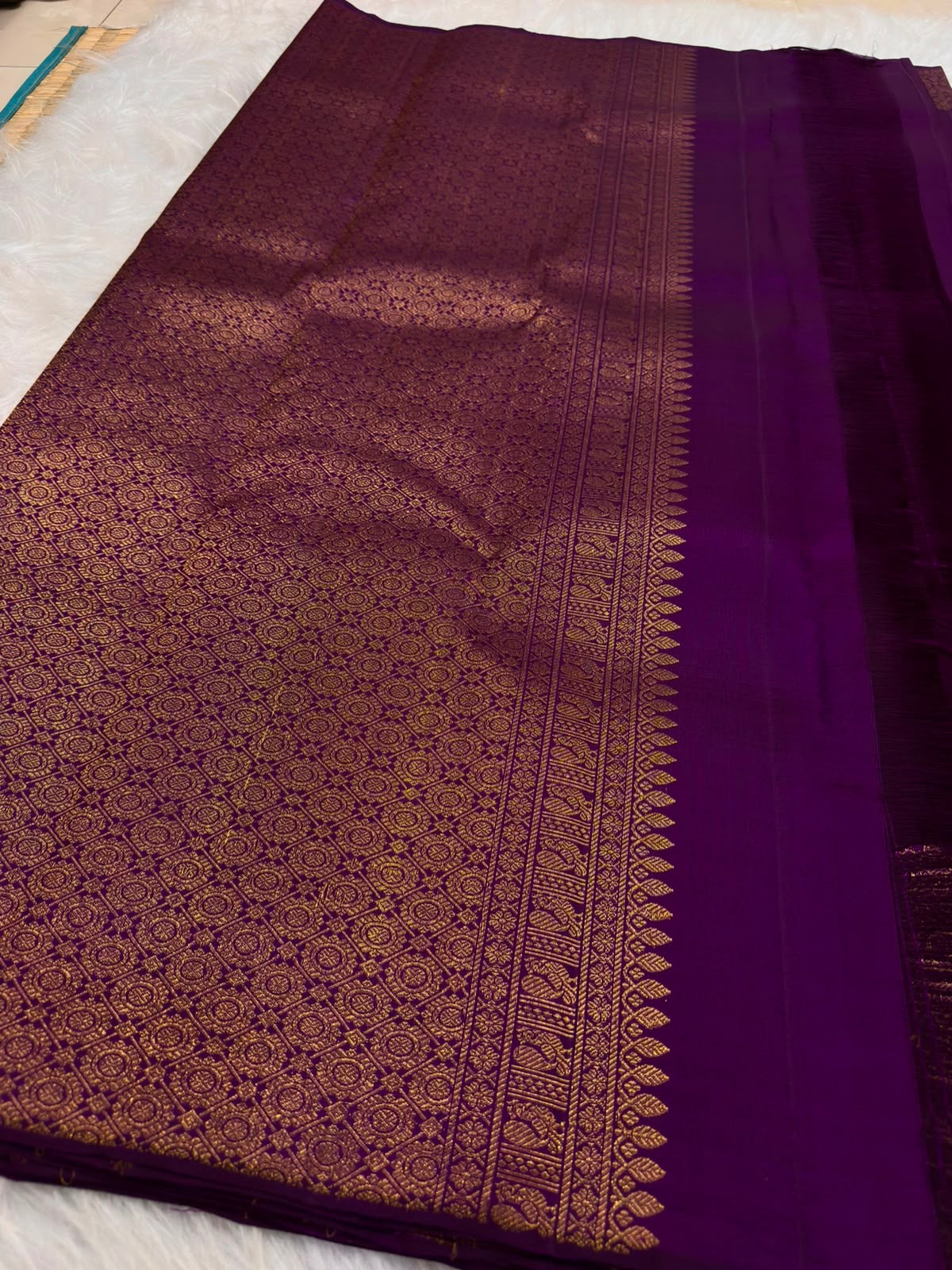 Gaja-Yali border detail on Royal Purple Kanjipuram pure silk saree