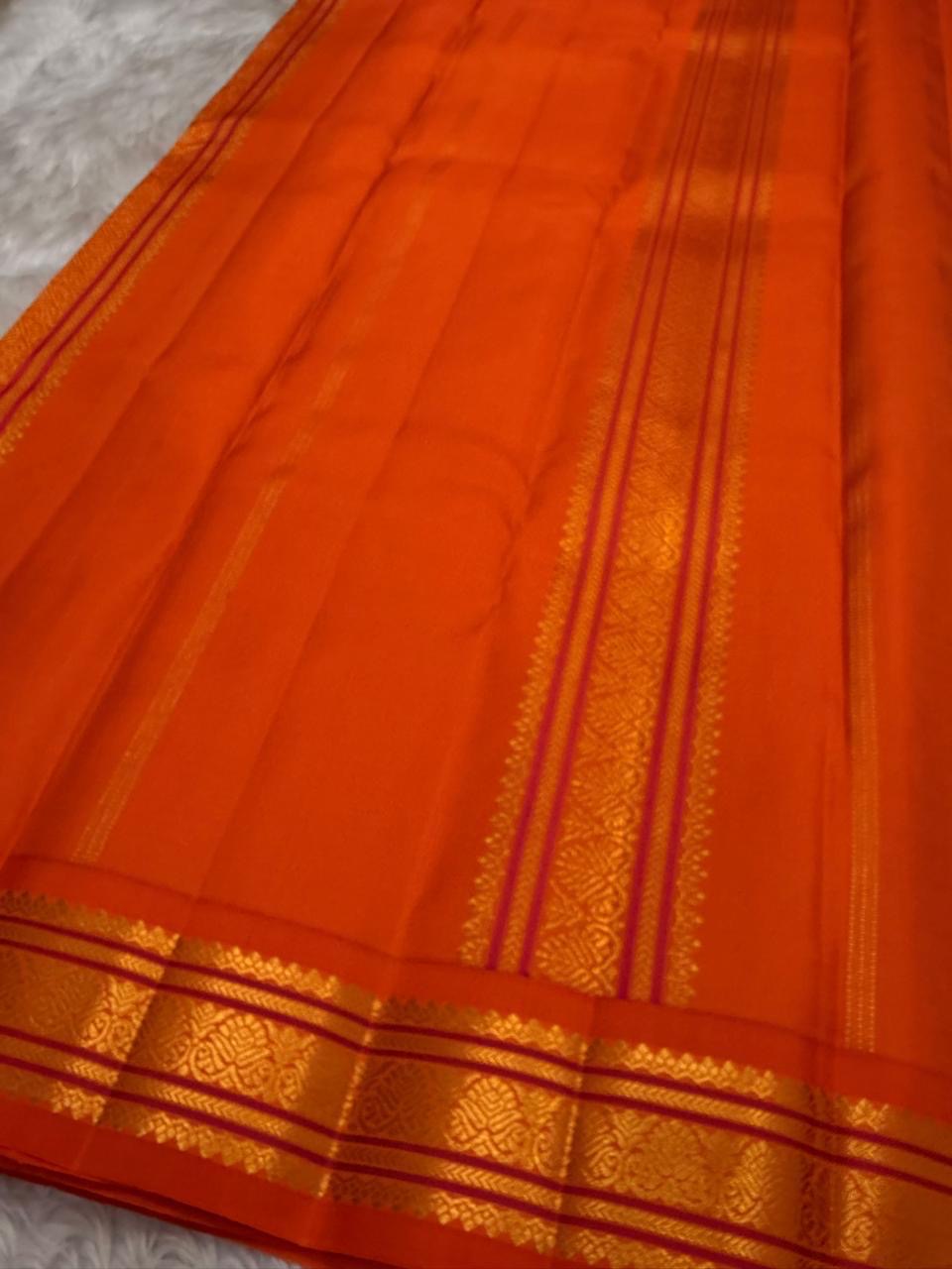 Mayil Chakram silk-thread butta motif detail on royal purple silk