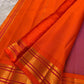 Gold zari border detail on royal purple KanchiPattu saree