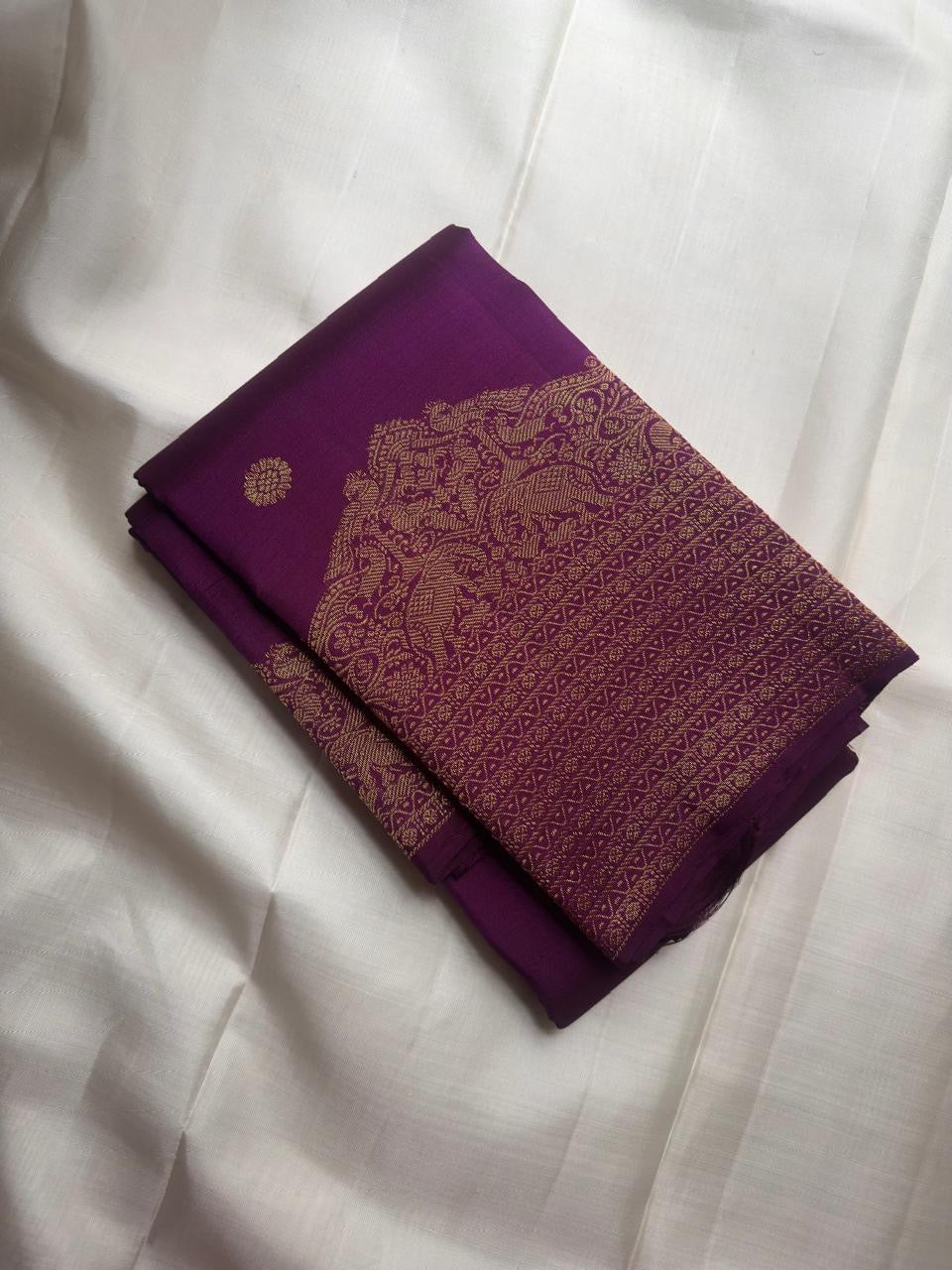 Royal purple Kanjeevaram Butta silk saree — zari butta motif close-up