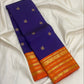 Royal Purple Kanjivaram body with traditional handwoven gold zari motifs