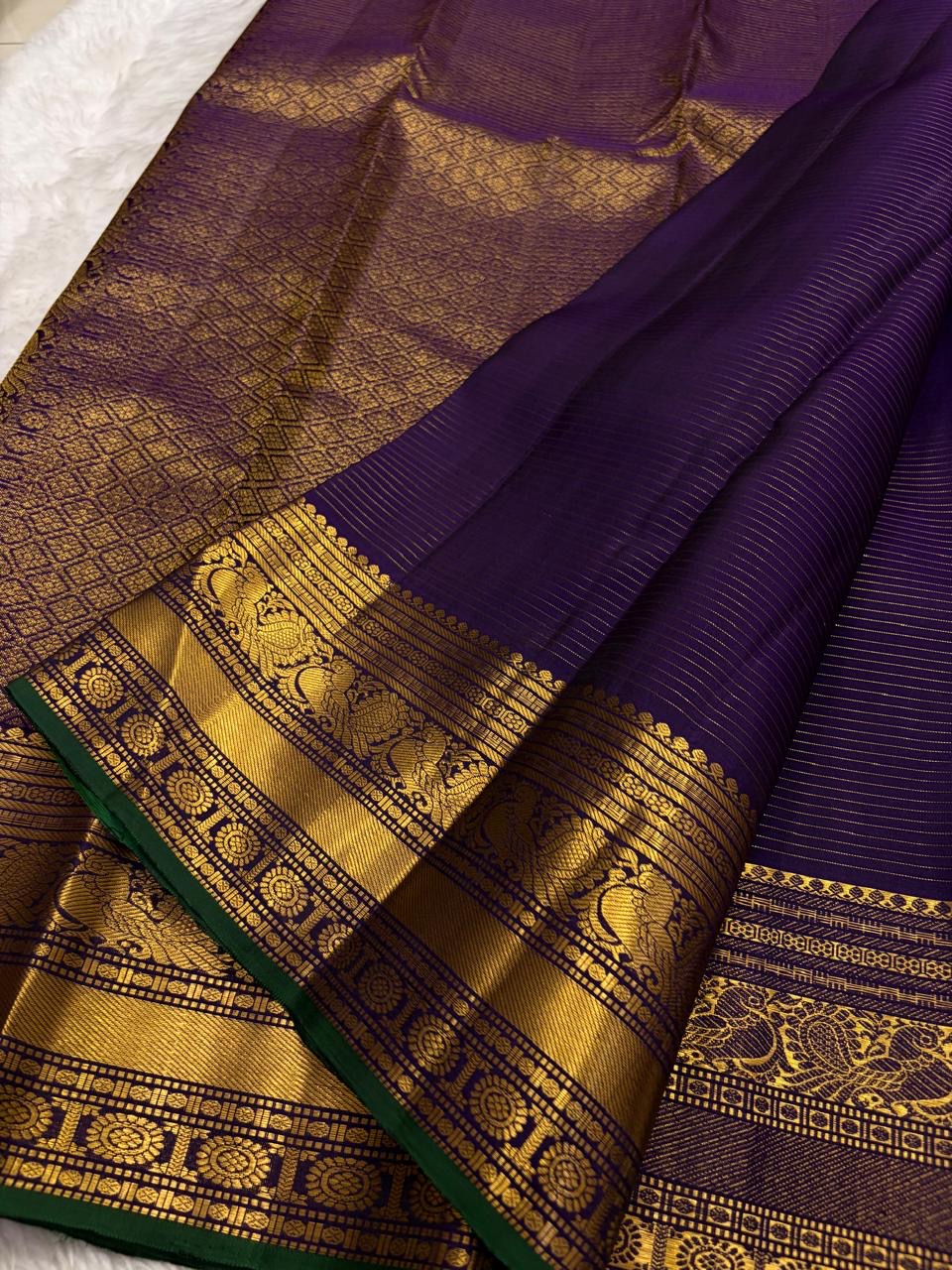 Royal Purple Handwoven Pure Silk Kanchipuram Saree with Zari Kattam and Mayil Butta Rudhraksham Border