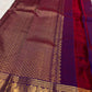 Royal purple Kanjipuram saree styled for a wedding occasion