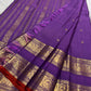 Close view of the peacock archway zari border on a pink lavender Kanjeevaram saree