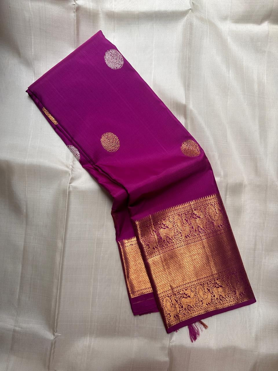 Royal purple Kanjivaram silk saree with silver gold mayil pallu