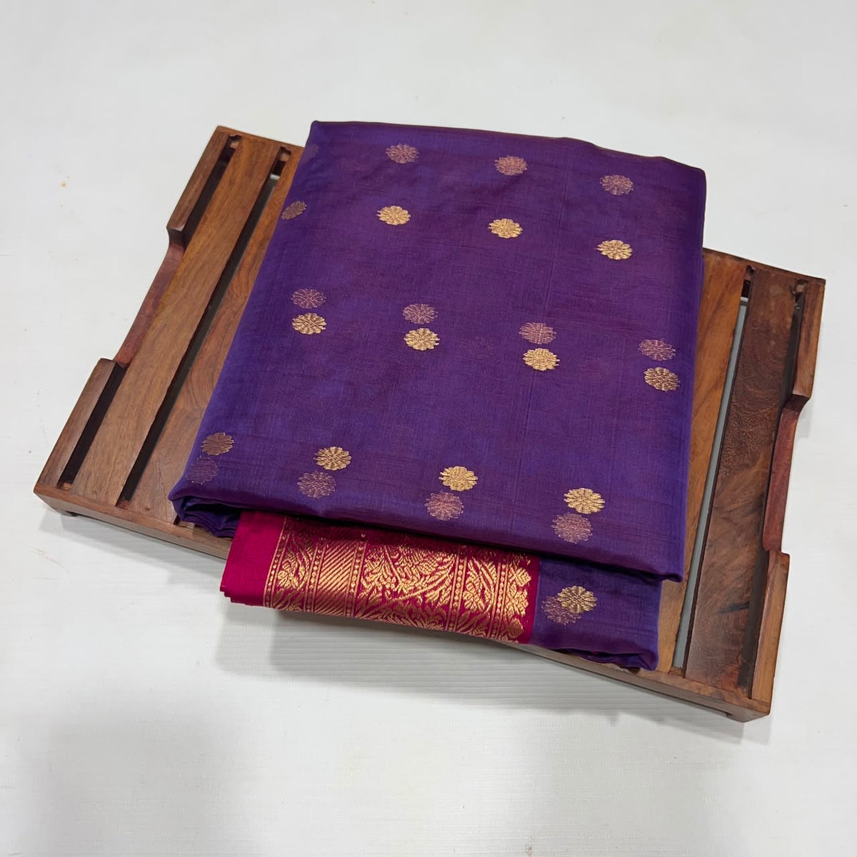 Royal Purple Katan Silk Chanderi saree with scattered gold floral buttas, ornate gold woven borders and Rani Pink edging.