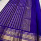 Grand Mayil peacock border on Mayil Kazhuthu blue-green Kanjivaram saree.
