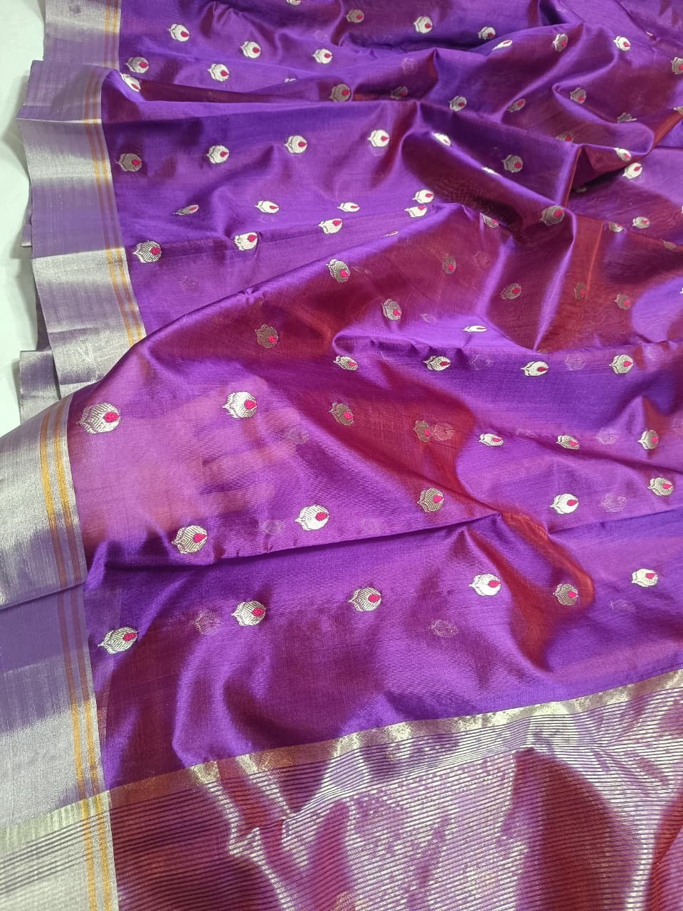 Detail of metallic woven buttas on a Royal Purple Pattu Silk Chanderi saree