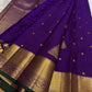 Handwoven Royal Purple Kanchipuram silk saree with antique-gold zari and Deep Green selvedge.
