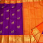 Royal Purple Pure Silk Kanjivaram Butta saree with Radiant Orange broad border