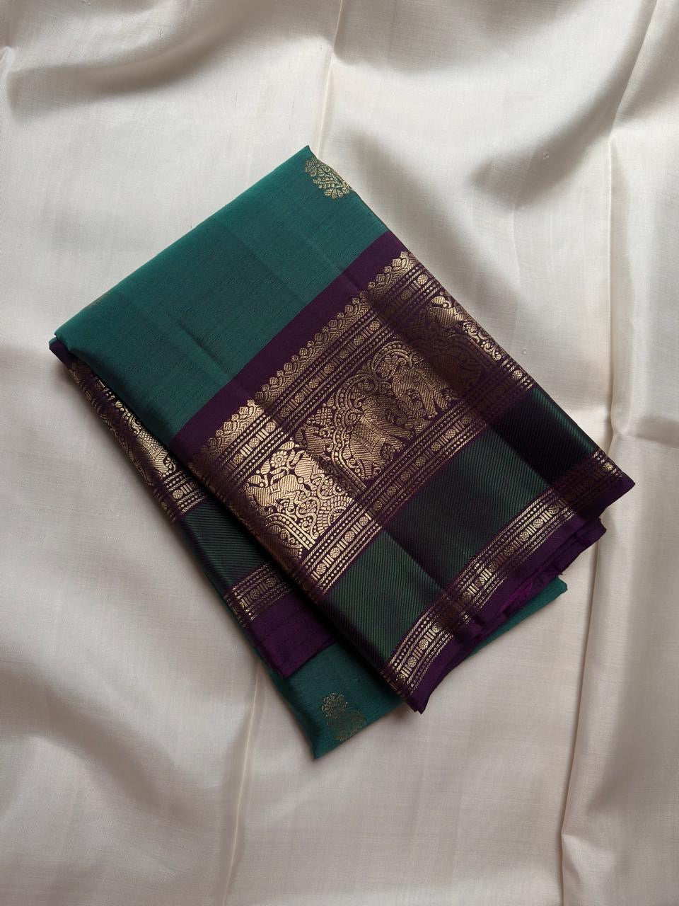 Pure Silk Kanchipuram Butta saree with antique gold elephant zari motifs