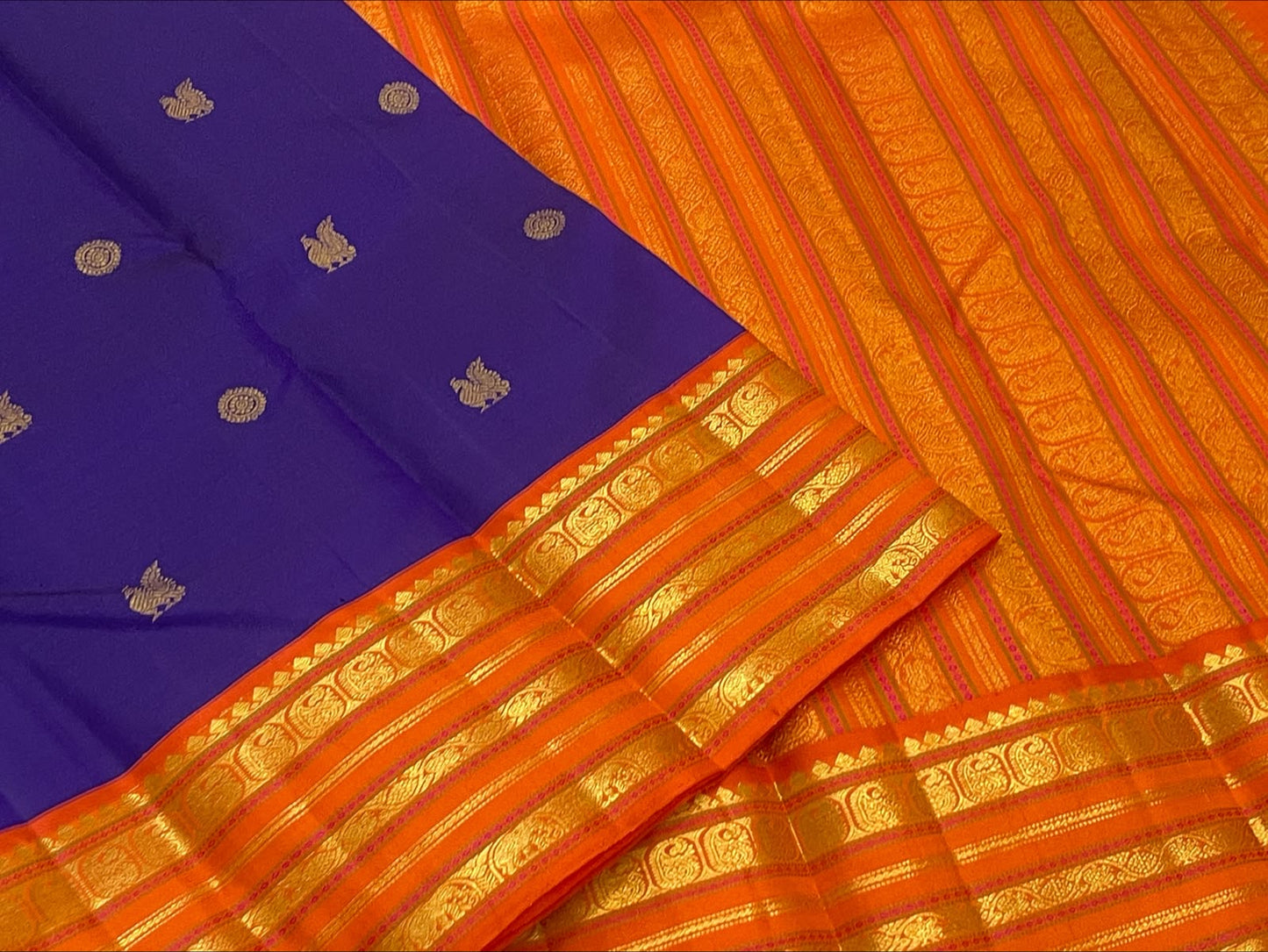 Royal Purple Pure Silk Kanjivaram Korvai saree with radiant orange border