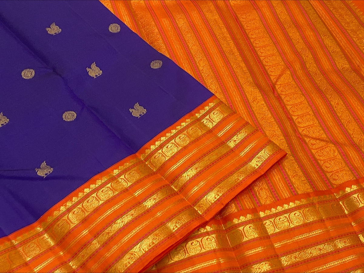 Royal Purple Pure Silk Kanjivaram Korvai saree with radiant orange border