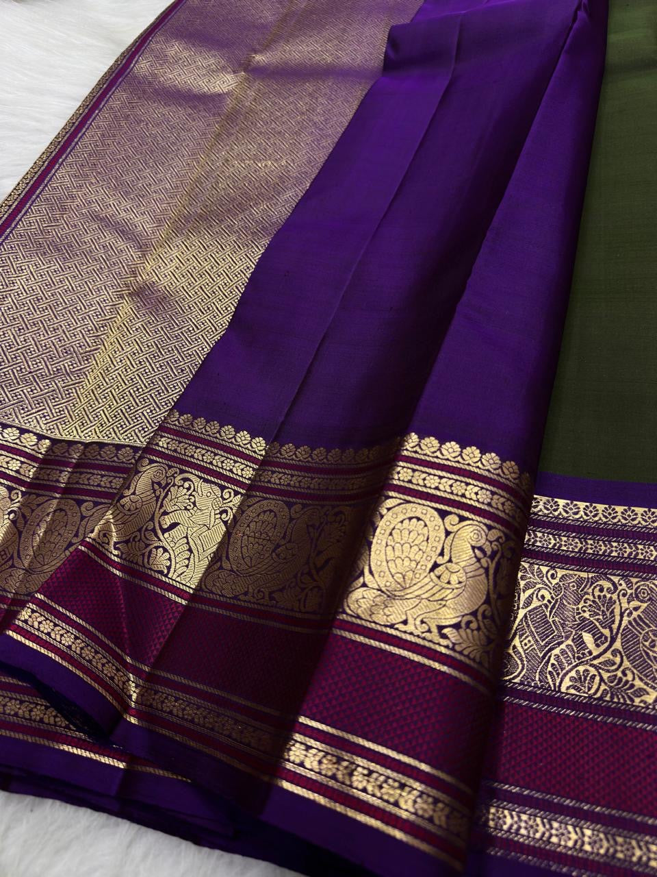 Pure Silk Kanchipuram Butta saree with antique gold peacock zari motifs