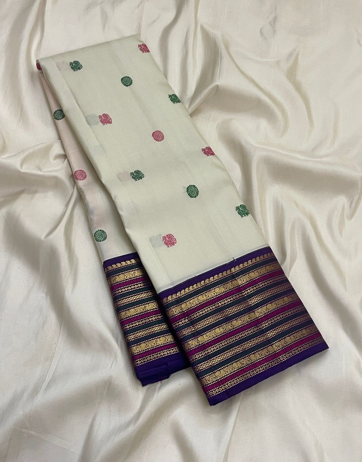 Royal Purple Kanjivaram border with antique gold zari pink and green accents