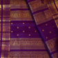 Royal violet-purple Kanchipuram silk body showing fine gold zari grid with spaced small antique-gold buttas.