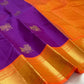 Handwoven purple Kanchipuram silk saree with 2-gram antique gold zari cow motifs