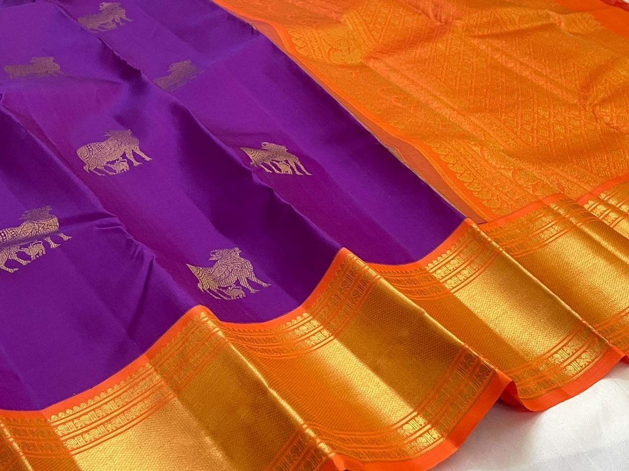 Handwoven purple Kanchipuram silk saree with 2-gram antique gold zari cow motifs