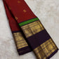 Handwoven Kanjeevaram Rettapet saree featuring deep jamun purple body and warm rust red selvedge