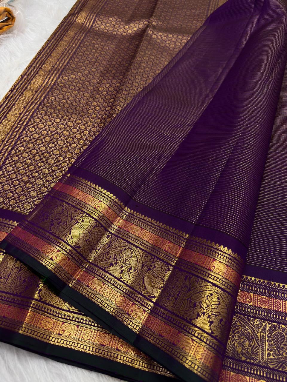 Royal Purple pure silk Kanchipuram saree — zari detail