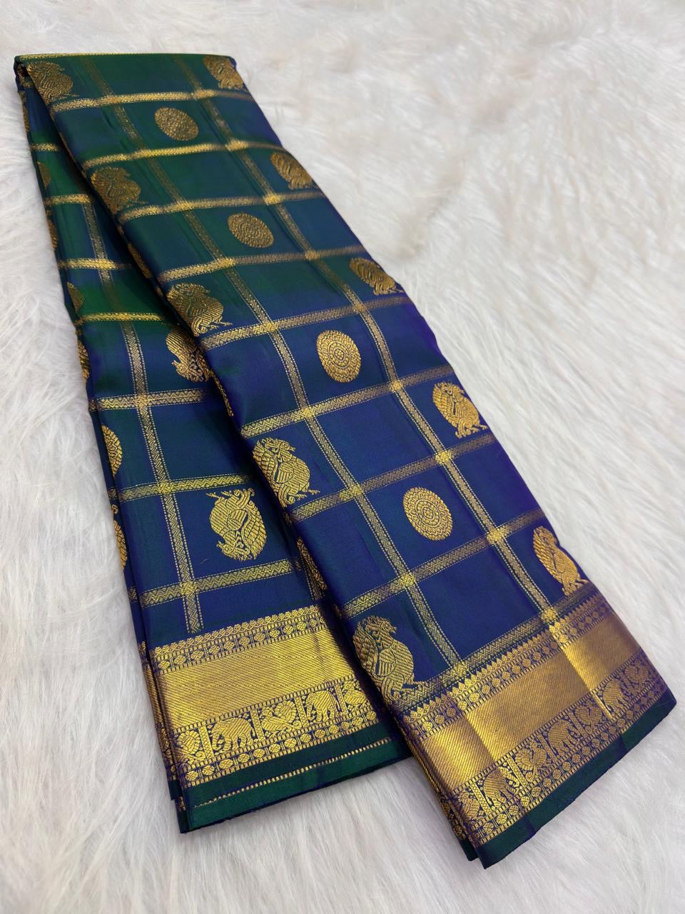 Royal teal blue handwoven pure silk Kanjeevaram Zari Kattam saree with Mayil Chakram zari motifs, full view