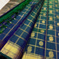 Royal teal blue Zari Kattam Kanjeevaram saree with Mayil Chakram, folded view