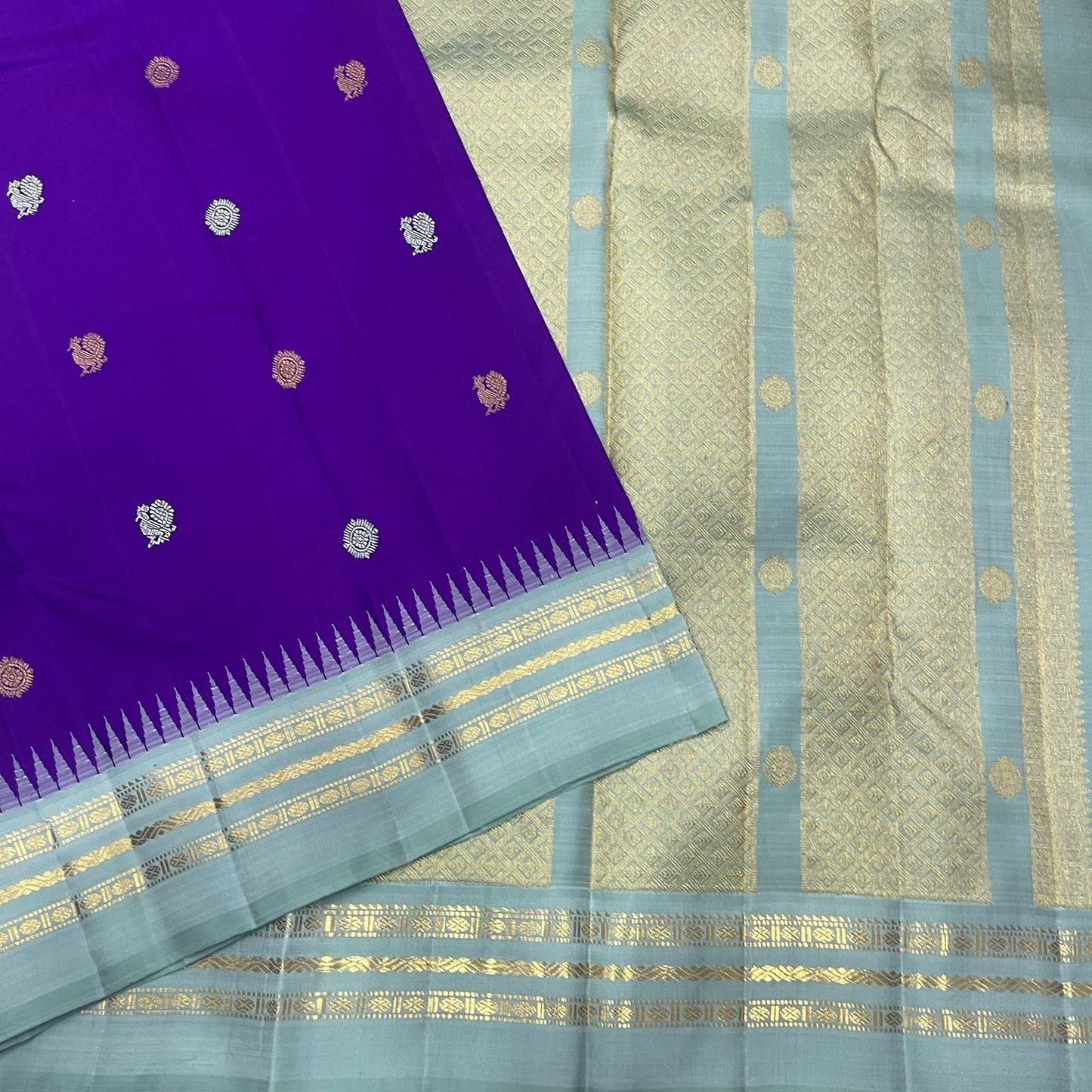 Ice blue pallu of royal violet blue Kanjeevaram pure silk saree with antique gold zari Varisaipet cascade
