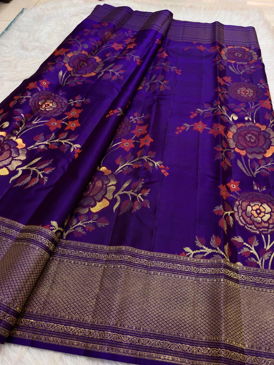 Royal Violet pure silk Kanchipuram Butta saree with intricate multicolour floral zari jaal.