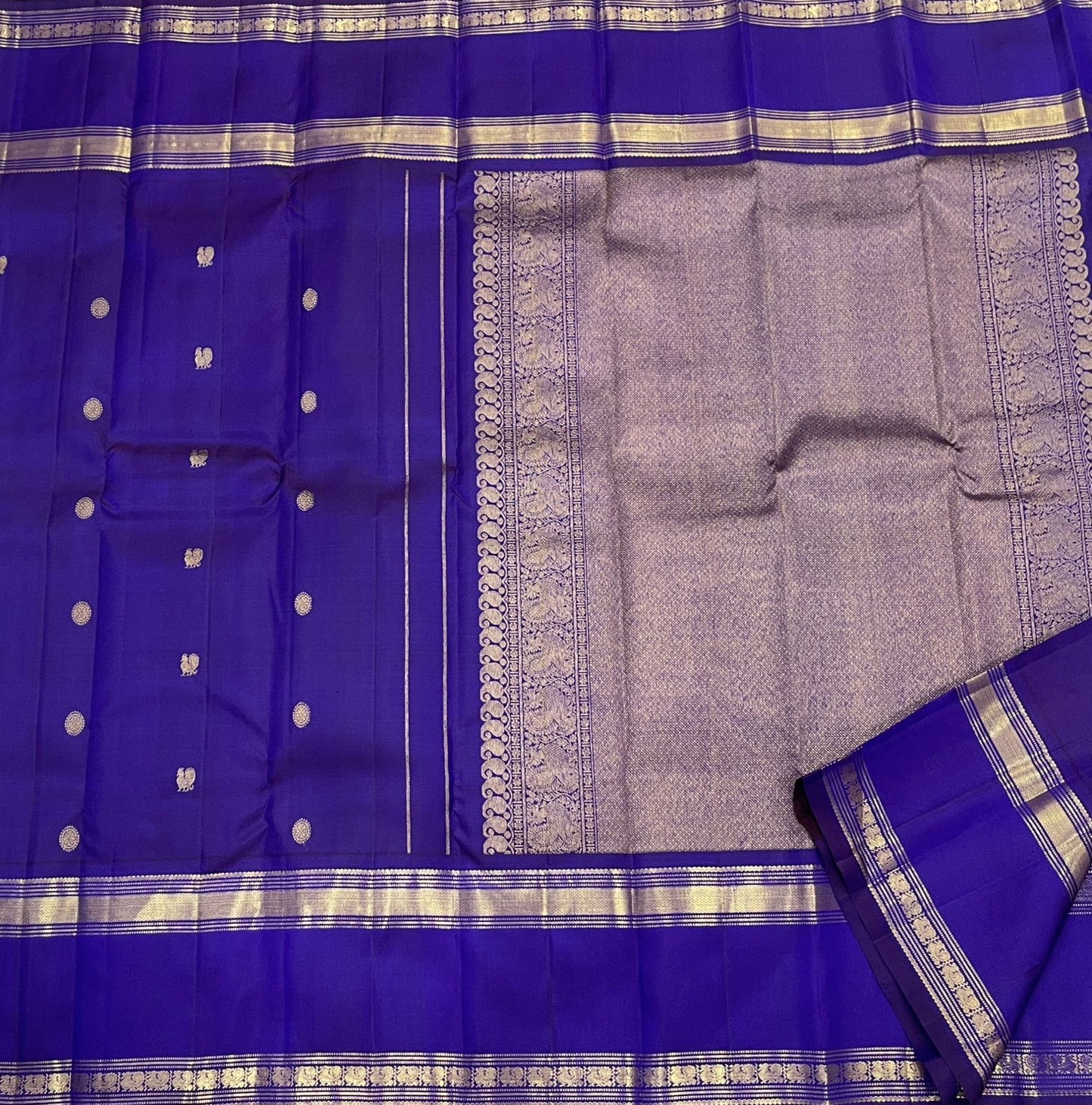 Royal Violet Purple pure mulberry silk saree with traditional Rettapet border.