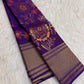 Handwoven purple Kanchipuram saree with large floral jaal in burnt orange rose sage and gold.