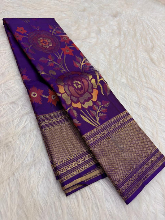 Handwoven purple Kanchipuram saree with large floral jaal in burnt orange rose sage and gold.