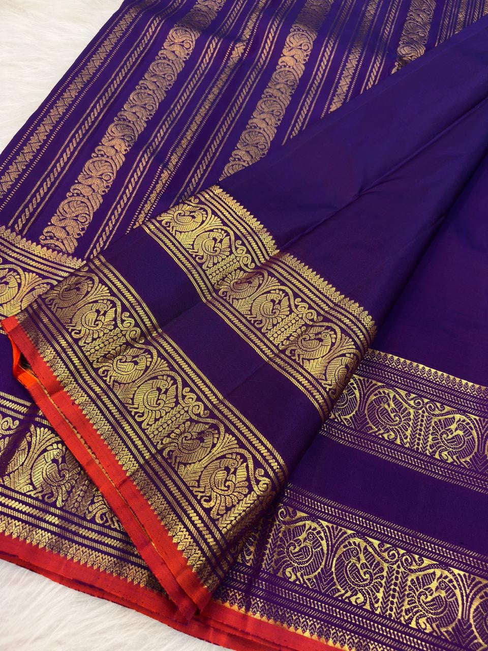 Deep Royal Violet Handwoven Pure Silk Kanchipuram Saree with Rettapet Mayil Zari Border and Orange-Red Selvedge