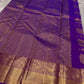 Royal violet Kanjeevaram pure silk saree with zari checks and floral jaal body.