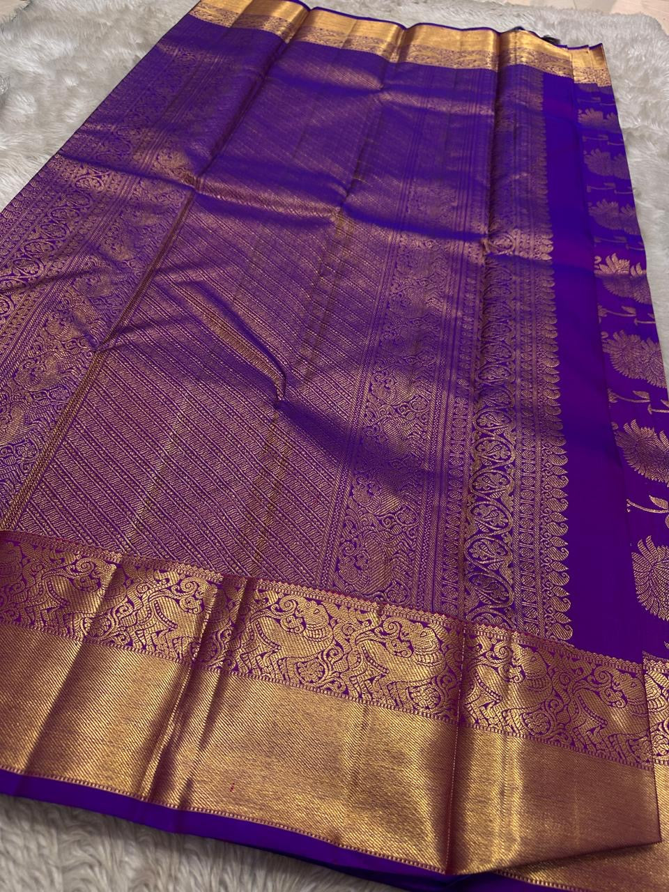 Royal violet Kanjeevaram pure silk saree with zari checks and floral jaal body.