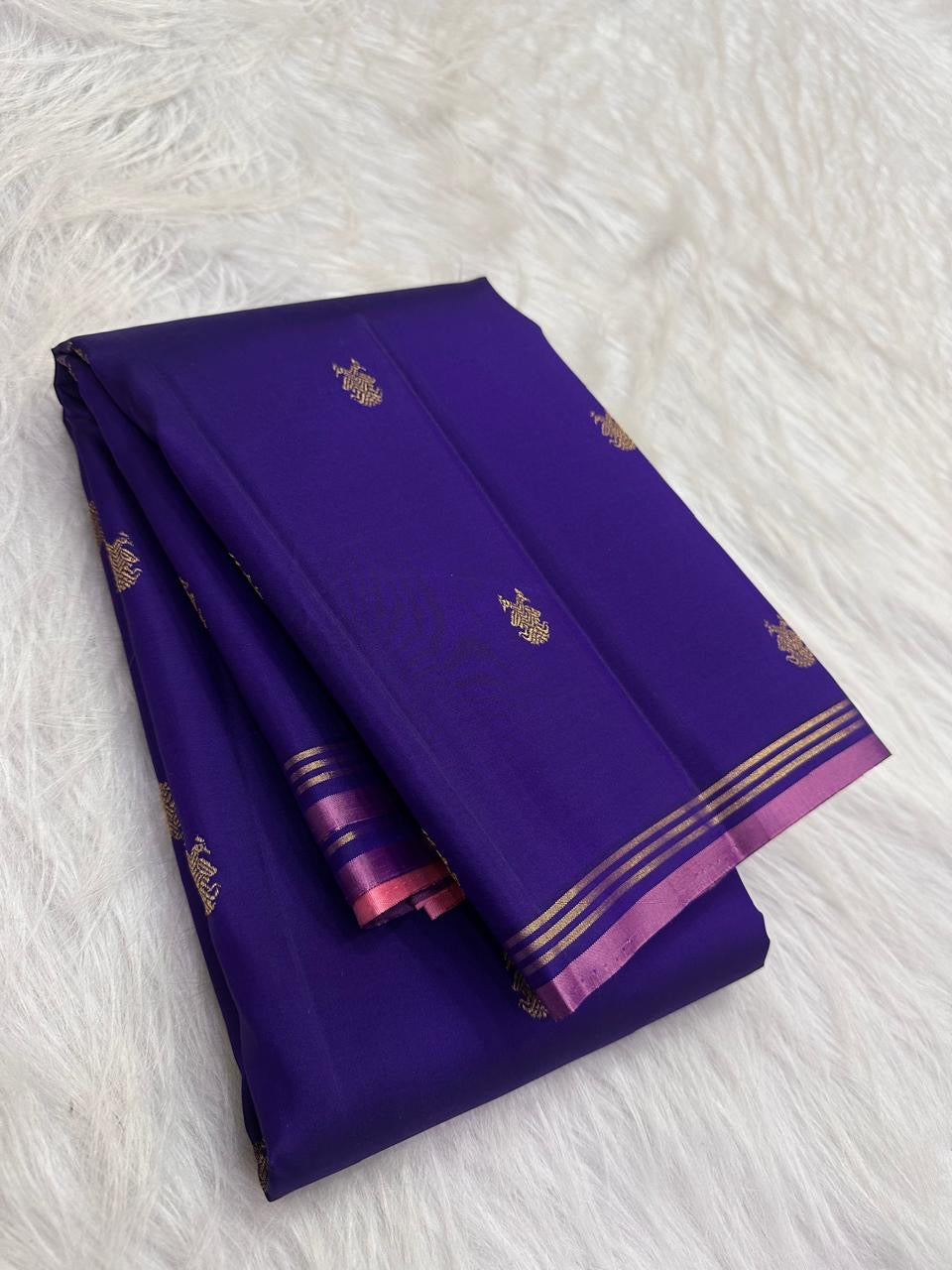 Royal Violet Kanjivaram silk saree with petite gold zari buttas and pink Pettu