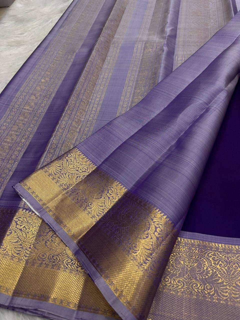 Royal Violet Kancheepuram Saree. Pallu detail with gold zari medallion work