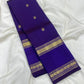 Royal Violet Purple Kanchipuram silk body with alternating small gold zari motifs.