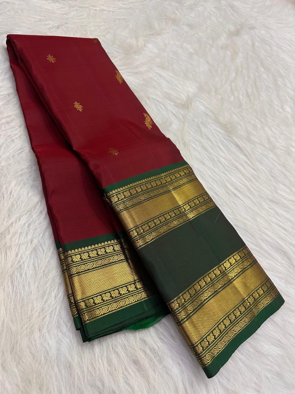 Forest green zari border detail close-up, Ruby Crimson Kanjivaram saree