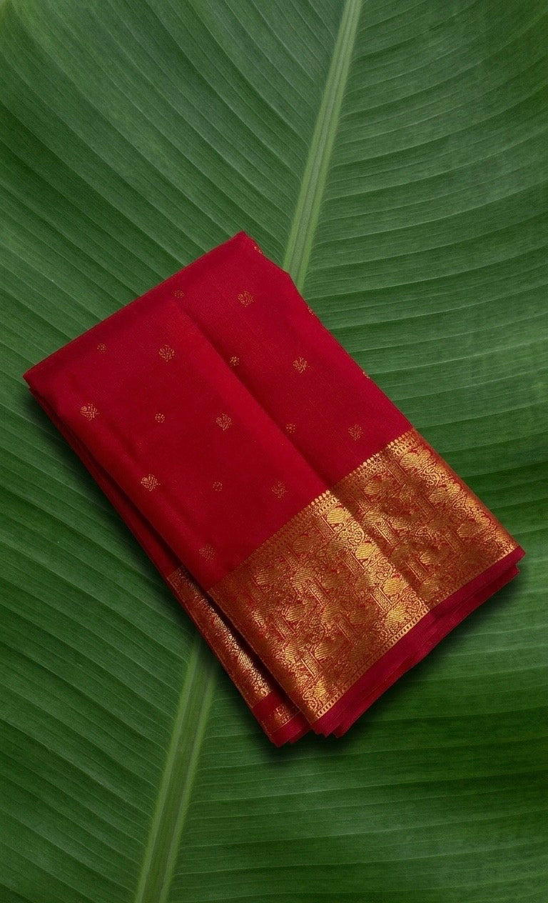 Kanchipuram silk saree in ruby red with antique gold border Varisaipet weave folded view