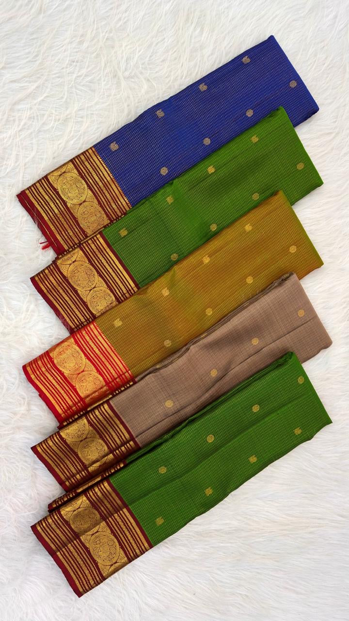 Handwoven Kancheepuram saree with a luminous zari grid body in royal blue