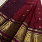 Ruby red Kanchipattu silk saree with sorgavaasal mayil peacock motif detail