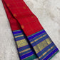 Ruby red Kanjeevaram silk saree violet korvai border mayil chakram zari butta