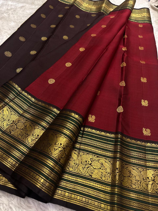 Ruby red Korvai Kanjeevaram silk saree body close-up with deep brown border detail
