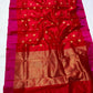 Ruby red floral Pattu Silk Chanderi saree with broad rani pink borders.