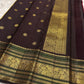 Ruby red Kanjeevaram saree yali motif zari detail on Korvai border