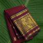 Ruby wine red Kanjivaram silk saree with plum violet border – front view