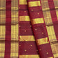 Rudraksham Pet gold zari border detail on leaf green Kanchipuram silk saree