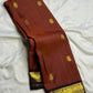 Deep Brown Korvai pallu with dense antique-gold zari weaving.