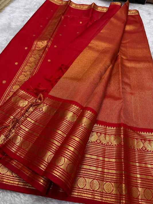 Rust orange and arakku red handwoven pure silk Kanjipuram saree with Korvai Vairaoosi diagonal zari stripe body and ornate antique gold zari border overview